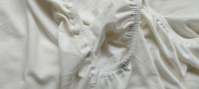 Sábana ajustable satén noble blanca - Storyfabrics